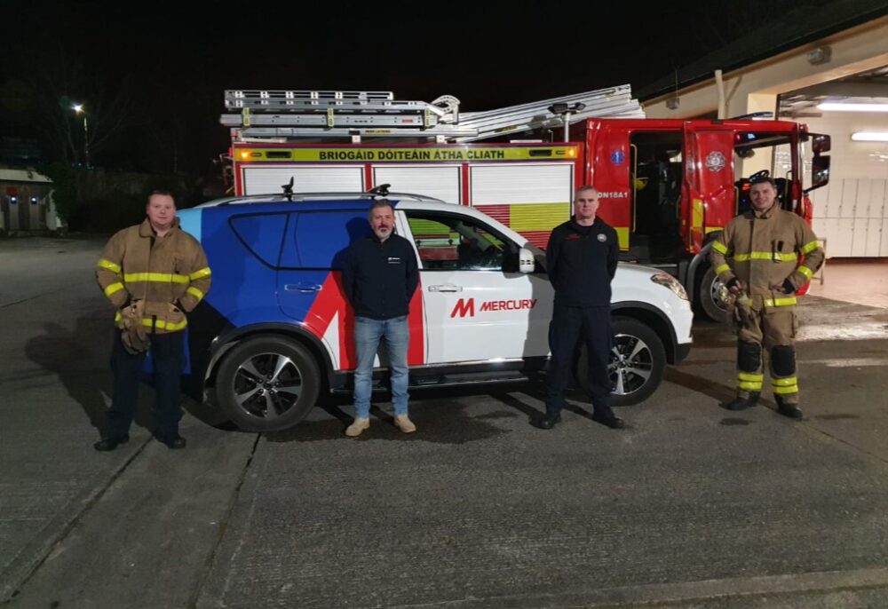 Mercury's Ken Murphy pictured alongside members of the Dublin Fire Brigade.