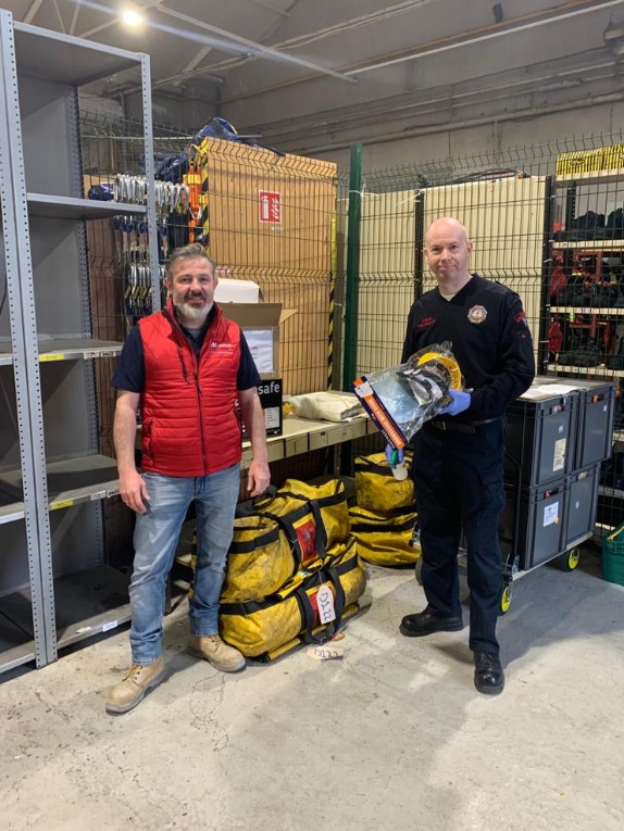 Mercury's Ken Murphy pictured alongside a member of the Dublin Fire Brigade.