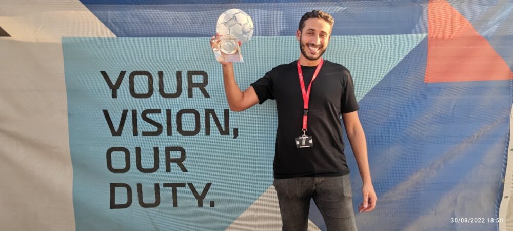 Karim pictured with the EURO50 Player of the Tournament Trophy.