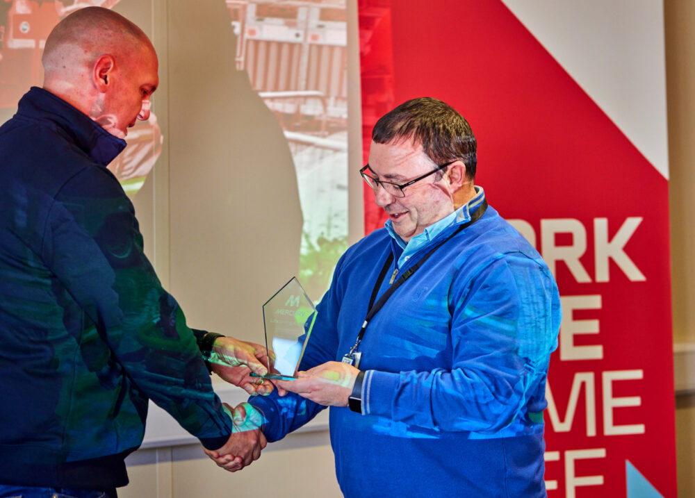 Dermot Gildea, Managing Director, Advanced Technology, presents Gary Webb with Mercury's Lifesaving Award.