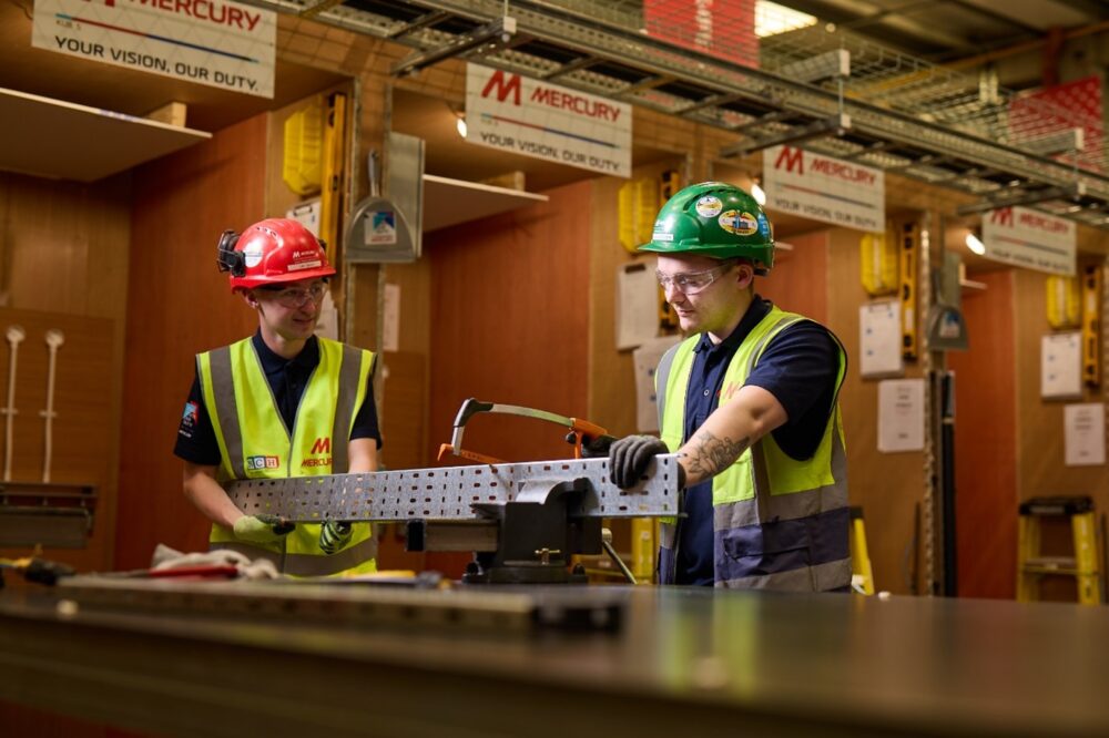 Matthew and one of his colleagues photographed at Mercury's Apprentice Development Centre.